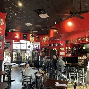 Beers drink there or to go, seating and bar