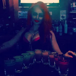 a woman sitting at a bar