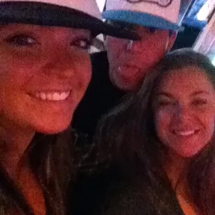 a group of people wearing hats