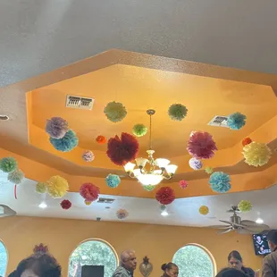 Decorations, chandeliers, beautiful ceiling fans.