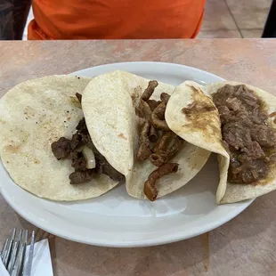 Beef fajita, crispy tripas and carné guisada tacos