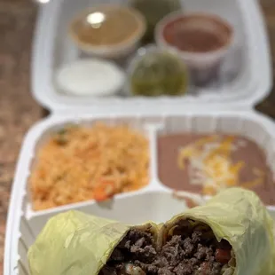 Carne Asada Burrito with rice and beans. Ordered to go tasted delicious&apos;