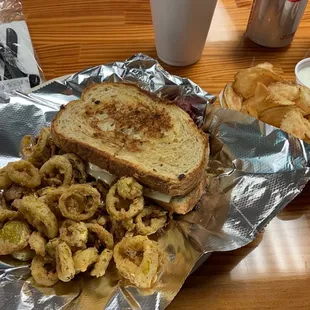 Reuben Sandwich with Finch&apos;s homemade chips and homemade fried pepper rings.    Highly recommend!