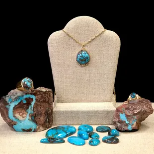 Natural Bisbee Turquoise set in Gold by Master Lapidary Bruce Mead.