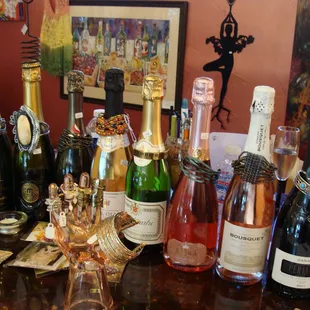 a table full of bottles of wine