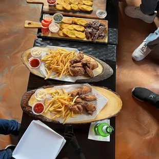 Chicken wings and fries and skirt steak with plantains very good 10 out of 10 and everything is made fresh