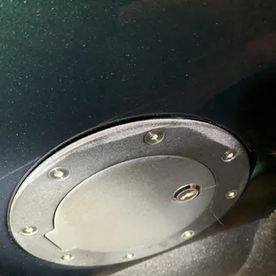 Wax on black gas cap