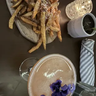 Truffle fries and a pink flirtini- I special requested this drink from the bar tender.