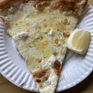 New religion: White slice with ricotta and lemon zest