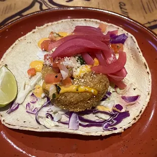 Elote Shrimp Taco . Mexican street corn, breaded crispy shrimp, roasted corn pico, Cotija, Chubasco Aioli.