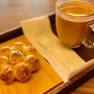 a cup of coffee and pastries