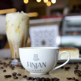 a cup of coffee on a table