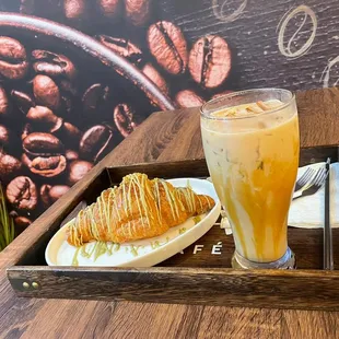 Ice finjan latte with honey and pistachios croissant