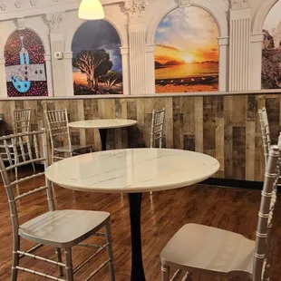 a table and chairs in a restaurant