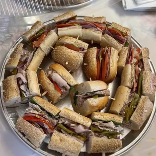 a platter of sandwiches on a table