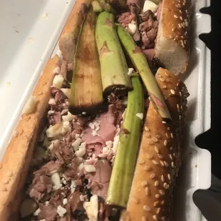 The Tacony. Roast beef with asparagus and crumbled provolone. Special sauce.