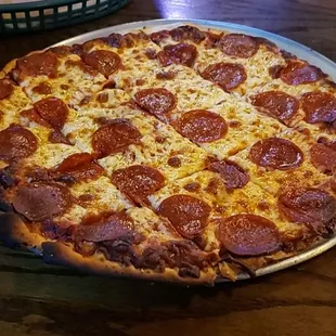 Pepperoni pizza cooked well done