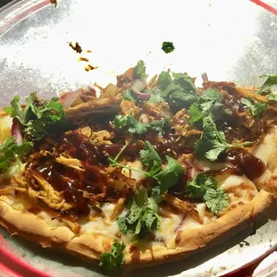 Barbeque Chicken Pizza.  Deserves a better photo.  Gooey cheesy goodness that packs flavor.