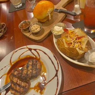The spread! Baked potato, amazing bread &amp; steak