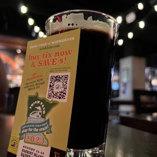 a pint of beer on a table