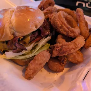 a hamburger and onion rings