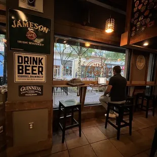 a man sitting at a bar