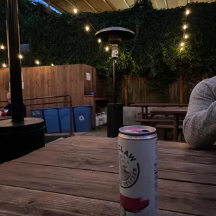 a can of beer on a table