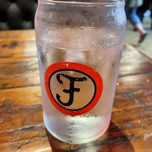 Water with logo on glass