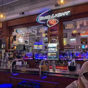 a woman sitting at the bar
