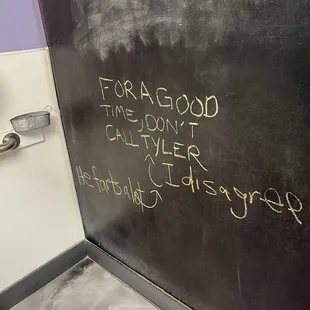 a blackboard with writing on it