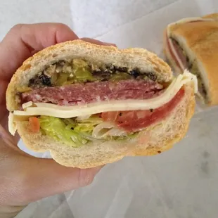 Veggie sub (3cheese, lettuce, black and green olive spreads, and tomato &amp;onion dressing) + salami