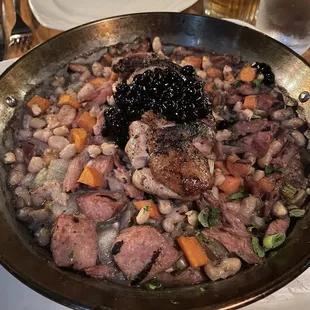 Duck Cassoulet: Roasted breast, confit, chicken apple sausage, cannellini beans, carrots &amp; mountain huckleberry compote. NOT a fan.