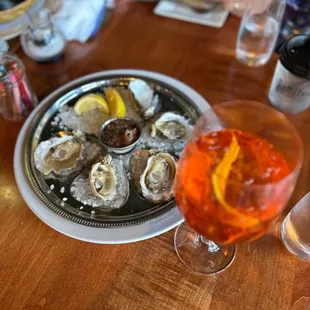 Oysters and aperol spritz