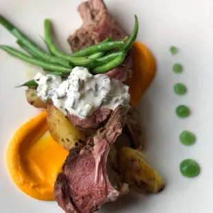 Lamb chop with beans tzatziki and sweet potato purée