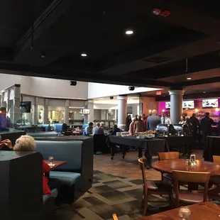 a restaurant with tables and booths