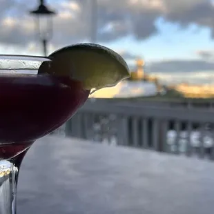 Blackberry gin gimlet at sunset