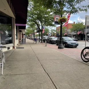 a bicycle parked on the sidewalk