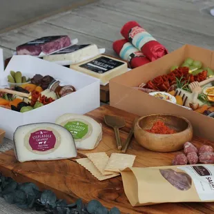 Charcuterie takeout boxes, artisan cheeses and salami options