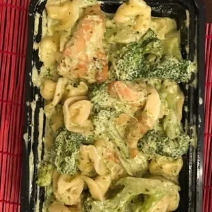 Chicken Tortellini: chicken &amp; broccoli in a pesto~cream sauce with six cheese tortellini &amp; romano cheese ($15)