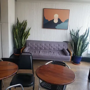 a living room with a couch and table