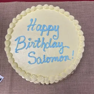 Vanilla, chocolate, vanilla cake with vegan buttercream frosting