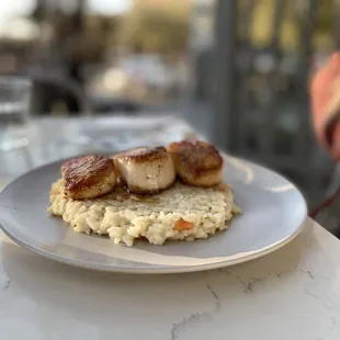 Scallops over Risotto