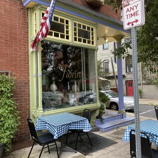 a table and chairs outside of a restaurant