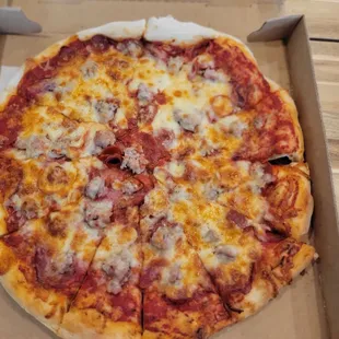 Pepperoni,  capicolla,  and sausage pizza
