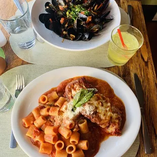 Chicken Parm with rigatoni and their mussels with thick pasta special.