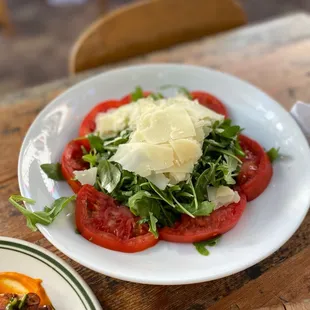 Arugula salad / tomatoes / parmesan / lemon vinagrette