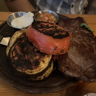 Bife de chorizo . ny steak / grilled tomato &amp; eggplant / salsa criolla / blue cheese