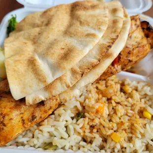 Veggie rice, pita, chicken kabob, and veggies