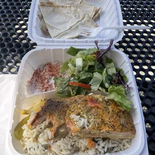 Salmon, vegetable rice, taziki, Greek salad, pita
