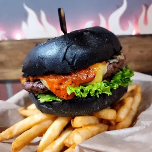 The Van Helsing - garlic glazed 1/2 pound steak patty, lettuce, tomato, grilled onions, Ghost Pepper jack, cheddar, Garlic &amp; Brimstone sauce
